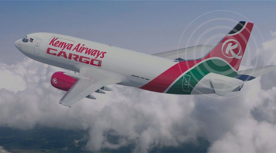 A cargo aircraft above the clouds