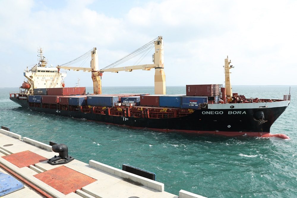 A fully loaded container ship at sea