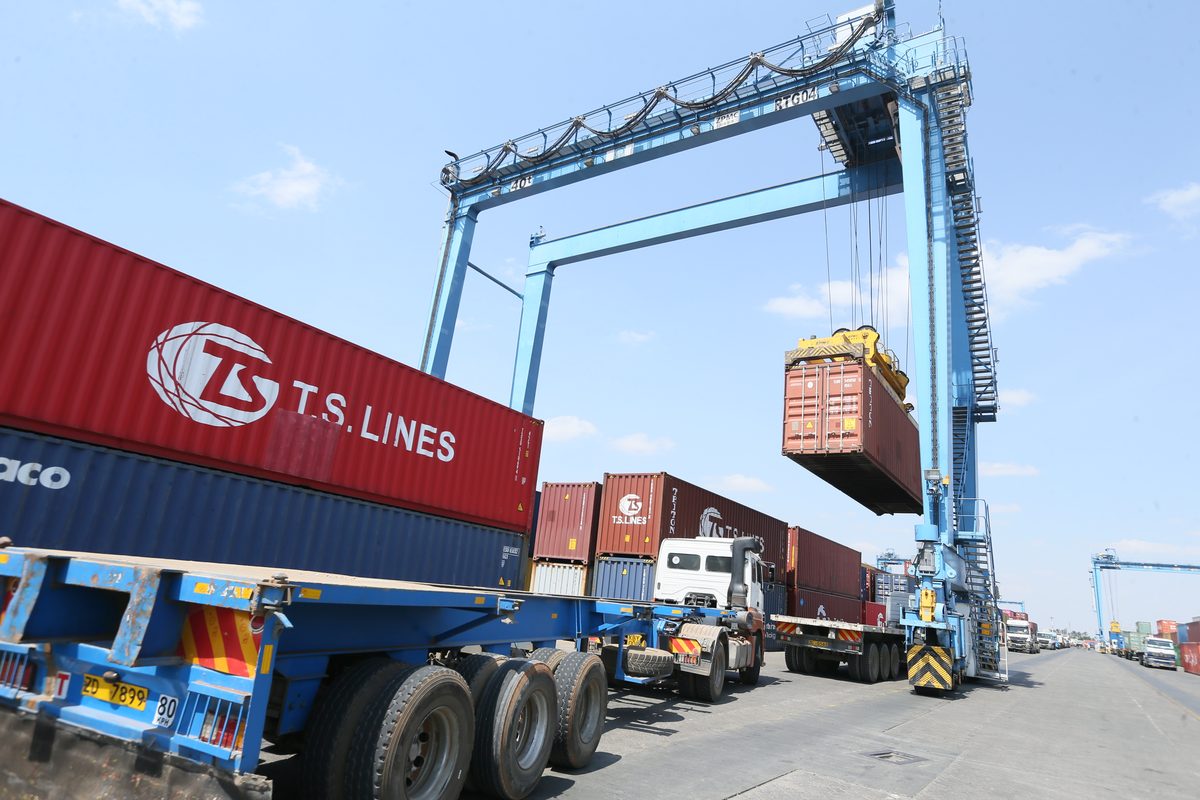 Gantry crane loading a container onto a truck