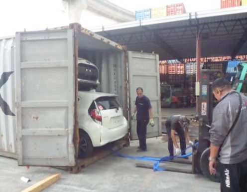 A truck being loaded at a warehouse dock